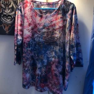 3/4 length shirt with some bling across the chest